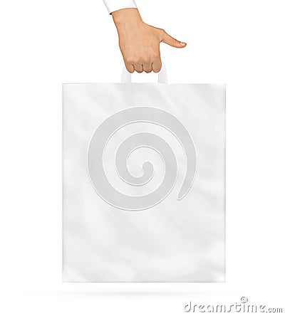 Blank plastic bag mock up holding in hand. Empty polyethylene pa Stock Photo