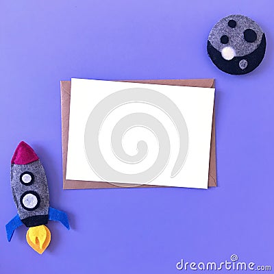 Blank Postcard Mockup with Rocket Moon Felt Toys Stock Photo