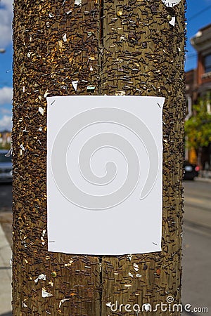 Blank poster on a wooden post Stock Photo