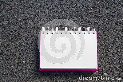 Blank realistic spiral notepad notebook on the road outdoor Stock Photo