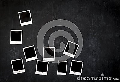 Blank retro photo frames attached to a metal blackboard with magnet Stock Photo