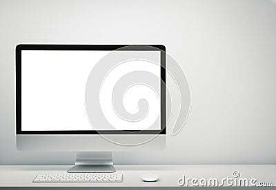 Blank screen computer display for mockup in office interior, Work desk with keyboard, mouse. Copy space on wall for text. Stock Photo