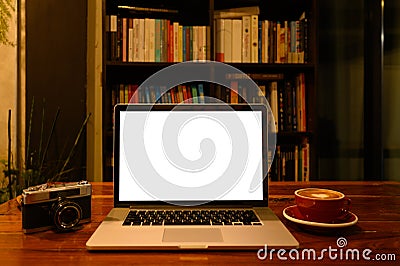 Blank screen of Laptop computer with film camera and coffee cup Editorial Stock Photo