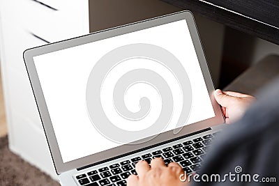 Blank screen laptop computer modern man use room laptop with blank white desktop screen with coffee cup on wooden table in cafe Stock Photo