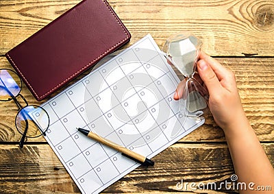 A blank sheet of notepad and a calendar for planning for a month or a year. Glasses, notepad and pen Stock Photo