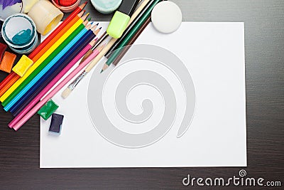 Blank sheet of paper with colorful instruments Stock Photo