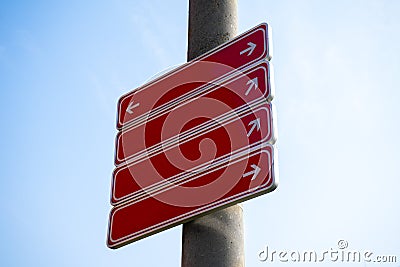 Blank sign post against blue sky Stock Photo