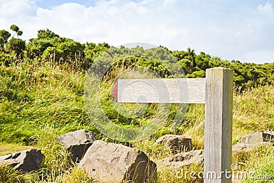 Blank signpost indicating a path for trekking in nature Stock Photo