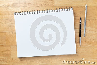 Blank Sketch Paper Tablet Binder Resting on Desk with Engineering Pencil and Ruler Stock Photo