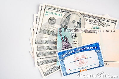 Blank social security card, united states treasury stimulus check and dollar bills Editorial Stock Photo
