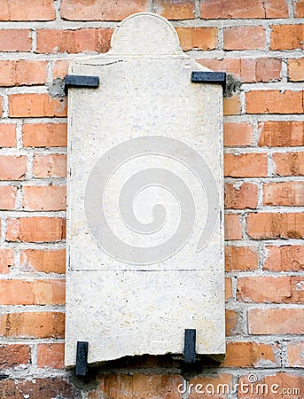 Blank stone slab on wall Stock Photo