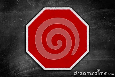 Blank stop sign on a black chalkboard Stock Photo