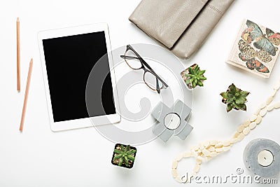 Blank tablet flat lay with desktop objects Stock Photo