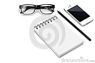 Blank template spiral white notebook notepad, glasses, pencil, smartphone isolated white background Stock Photo