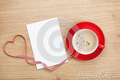 Blank valentines greeting card and red coffee cup Stock Photo