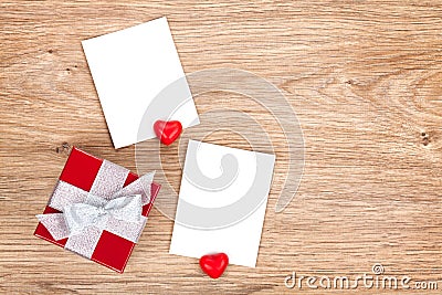 Blank valentines photo frames and small red gift box Stock Photo