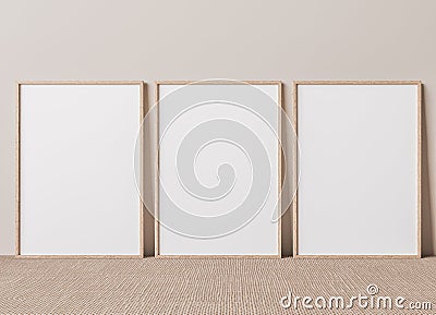 Blank vertical poster frame mock up standing on beige floor. Stock Photo