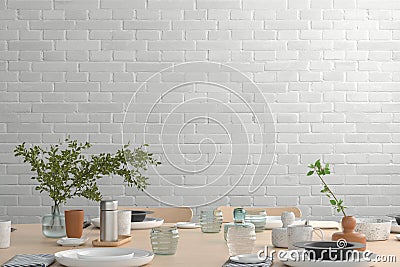 Blank wall mock up in the dinning room with served table Stock Photo