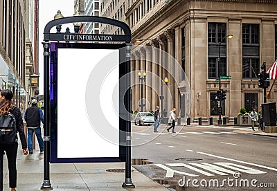 Blank billboard at bus stop for advertising, Chicago city buildings and street background Editorial Stock Photo