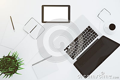 Blank white digital tablet screen with accessories and laptop on Editorial Stock Photo