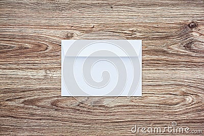 Blank white envelope on wooden background Stock Photo