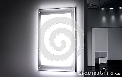 Blank white illuminated poster mock up in dark hall Stock Photo
