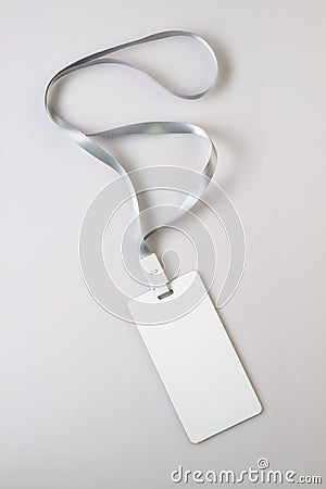 Blank White Lanyard Tag Badge Mockup on grey background Stock Photo