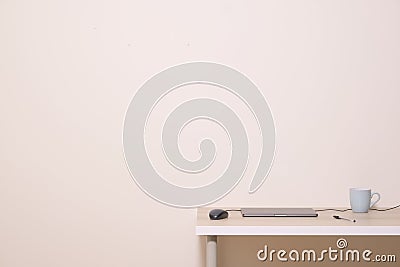 Blank white advertisement wall above office home desk cup laptop mouse pen neutral empty background Stock Photo