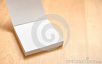 Blank white notepad on wooden table,Template mock up for adding Stock Photo