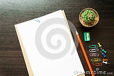 Blank white paper and colored pencil. Stock Photo