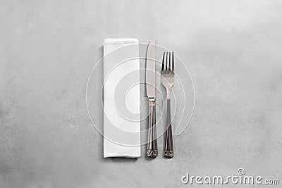 Blank white restaurant napkin mock up with fork and knife, Stock Photo