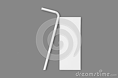 Blank white small Cardboard juice box with straw mockup isolated on a grey background. 3d rendering. Stock Photo