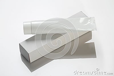 Blank White Toothpaste / Medicinal Cream Tube & Box Mockup Stock Photo