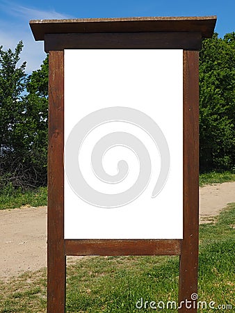 Blank white vertical rectangular pylon stand on forest dirt road mock up. Empty panel for advertisement, promotion Stock Photo