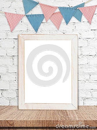 Blank white wooden frame and party flags background Stock Photo