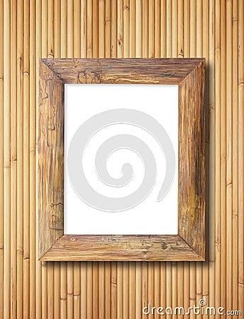 Blank wooden frame on bamboo wall Stock Photo