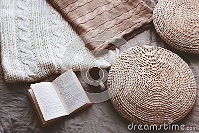 Blankets, ottomans and reading Stock Photo