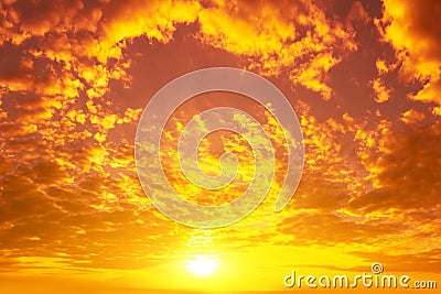 Blazing cloudy sky at sunset Stock Photo