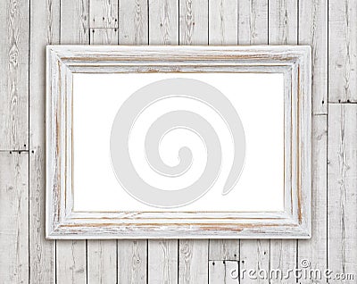 Bleached wooden picture frame on vintage plank wall background Stock Photo