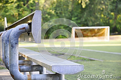 Bleacher seats with soccer field and net. Stock Photo