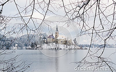 BLED, SLOVENIA - JANUARY 2015: view over Gothic church on the lake island Editorial Stock Photo