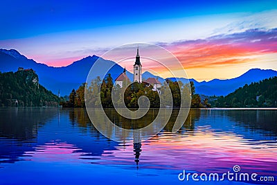 Bled, Slovenia. Morning view of Bled Lake, island and church with Julian Alps in background Stock Photo