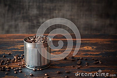 Blended coffee beans in a tin can on a rustic wooden table among scattered coffee beans, blended, vintage Stock Photo