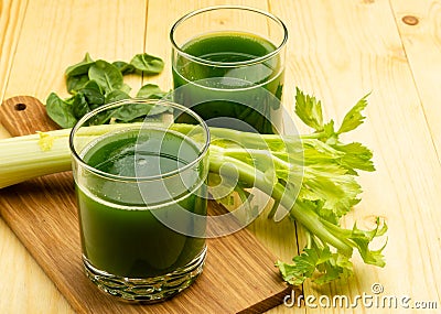 Blended green juice with ingredients. Superfood, detox and healthy concept. selective focus Stock Photo