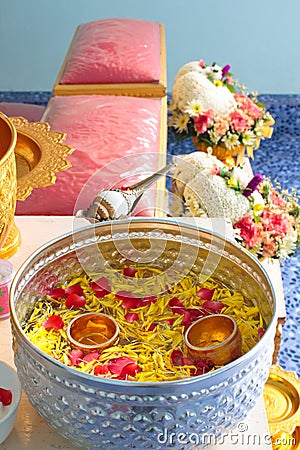 Blessed water at Thai wedding ceremony. Stock Photo