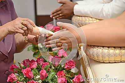 Blessed water at Thai wedding ceremony Stock Photo