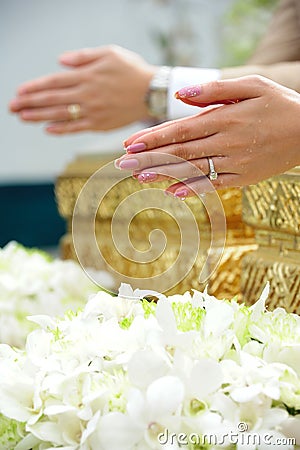 Blessed water at Thai wedding ceremony Stock Photo