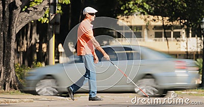 Blind Man Crossing The Road With Cars And Traffic Stock Photo