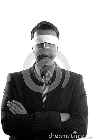Blindfolded businessman over white background Stock Photo