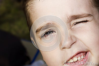 Blinks eye handsome boy Stock Photo